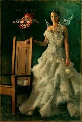 Illustration for article titled Catching Fire character poster pays tribute to the Hunger Games's unsung hero: Buttercup